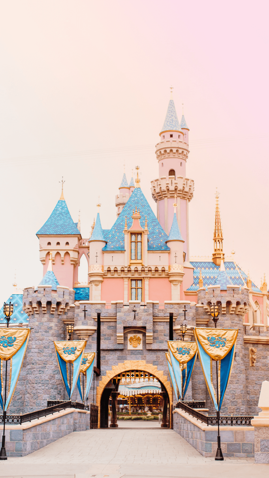 My favorite part of going to any Disney park is the wonderful colors! These dreamy Disneyland wallpapers caputre a pastel magic for your mobile phone.